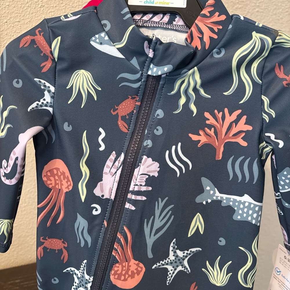 Carter's Navy One-Piece Rashguard with Coral, Mint & Light Blue Sea Life Print - Picture 2 of 3